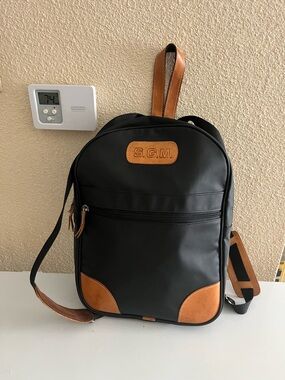 Jon Hart Design Black Backpack with Tan Leather Accents and Monogram